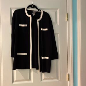 Black and cream trimmed open front cardigan by Anne Klein.